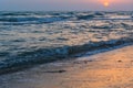 Sunset over the sea on wild beach of Persian gulf coast. Iran Royalty Free Stock Photo