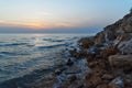 Sunset over the sea on wild beach of Persian gulf coast. Iran Royalty Free Stock Photo