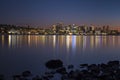 Sunset over Seattle`s skyline creating reflections in Lake Washington Royalty Free Stock Photo