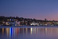 Sunset over Seattle`s skyline creating reflections in Lake Washington Royalty Free Stock Photo