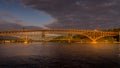 Sunset over the Second Narrows Bridge Ironworkers Bridge of the Trans Canada Highway and a Railway Bridge, Vancouver, Canada Royalty Free Stock Photo