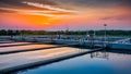 Sunset Over Sewage Treatment Aeration Tanks. Concept Sunset, Sewage Treatment, Aeration Tanks