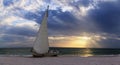 Sunset over shipwreck on the coast of Clam Pass in Naples Royalty Free Stock Photo