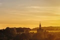 Sunset over the silhouette of the tower church in a English village of Boxford, England Royalty Free Stock Photo