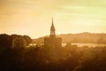 Sunset over the silhouette of the tower church in a English village of Boxford, England Royalty Free Stock Photo