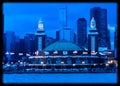 Navy Pier juts into Lake Michigan with Chicago skyline in background. Royalty Free Stock Photo