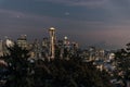 Sunset over the skyline of the city of Seattle and the profile of Mount Rainier in the background. Royalty Free Stock Photo