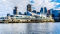 Sunset over the Skyline with High Rise Buildings and the Canada Place Cruise Terminal in Downtown Vancouver Royalty Free Stock Photo