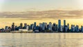 Sunset over the Skyline with High Rise Buildings and the Canada Place Cruise Terminal in Downtown Vancouver Royalty Free Stock Photo