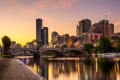 Sunset over skyscrapers of Melbourne downtown, Princes Bridge an