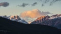 Sunset over snow capped mountains, Banff National Park