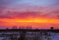 Sunset over the snowy field Royalty Free Stock Photo