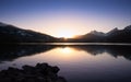 Sunset over snowy mountains and Lake Calacuccia in Corsica Royalty Free Stock Photo