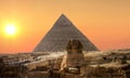 Sunset over Sphinx and Pyramid Royalty Free Stock Photo
