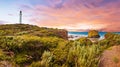 Sunset over Split Point Lighthouse and Eagle rock on Great Ocean Road in Australia Royalty Free Stock Photo