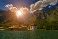 Sunset over St.Bartolomei Church on Bonigsee Lake Royalty Free Stock Photo