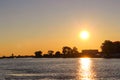 Sunset over the Sulina shipyard and the Danube Delta Royalty Free Stock Photo