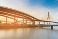 Sunset over Suspension Bridged and Highway interconnection river