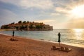 Sunset over Sveti Stefan islet in Montenegro Royalty Free Stock Photo