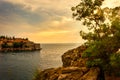 Sunset over Sveti Stefan islet in Montenegro Royalty Free Stock Photo