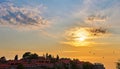 Sunset over Sveti Stefan. Islet and resort in Montenegro. Budva Riviera. Balkans, Adriatic Sea, Royalty Free Stock Photo