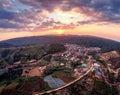 Sunset over Thai tribe village with wild himalayan cherry tree blooming in countryside at Ban Rong Kla Royalty Free Stock Photo