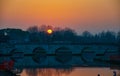 Sunset over Tiberius Bridge in Rimini