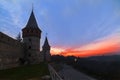 Sunset over the tower of medieval half-ruined castle Royalty Free Stock Photo