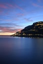 The sunset over a town on the Campania coast on the road to Amalfi.