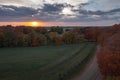 Sunset Over Trees Road and Fenceline Autumn Royalty Free Stock Photo