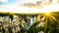 Sunset over the Upper Falls in the Grand Canyon of the Yellowstone River in Yellowstone National Park in Wyoming, USA Royalty Free Stock Photo