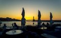 Sunset over The Venetian era harbour and lighthouse at the Mediterranean port of Chania, Crete, Greek Islands, Greece Royalty Free Stock Photo