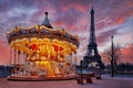 Sunset over vintage carousel close to Eiffel Tower, Paris