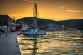 Sunset over Vis town, Croatia. Royalty Free Stock Photo