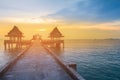 Sunset over walk way leading to seacoast skyline Royalty Free Stock Photo