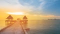 Sunset over walkway leading to sea coast skyline Royalty Free Stock Photo