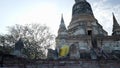 Sunset over Wat Yai Chai Mongkhon Buddhist temple in Ayutthaya, Thailand - gimble panning