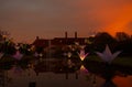 Warm sunset over Jellicoe canal, illuminated with lights. Wisley, Surrey. Royalty Free Stock Photo
