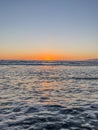 Santa Monica sunset over the water with light rays reflected into the Pacific Ocean Royalty Free Stock Photo