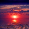 Sunset over water surface Royalty Free Stock Photo