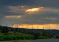Sunset over windturbines, on a hill near to Narbonne, Aude, France. Royalty Free Stock Photo