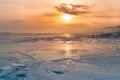 Sunset over winter frozen water lake Royalty Free Stock Photo