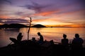 Sunset over wooden beach bar in sea and hut on pier in koh Mak island, Trat, Thailand Royalty Free Stock Photo