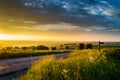 Sunset over the Yorkshire meadows, with a road Royalty Free Stock Photo