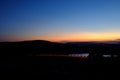 Sunset overlooking Cadillac Mountain in Maine with traffic streaking past Royalty Free Stock Photo