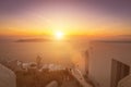 Sunset overlooking the caldera and the sea in the village of Imerovigli on the island of Santorini in the summer. Greece. Royalty Free Stock Photo