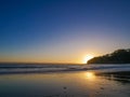 Sunset upon the Pacific ocean, kelp and sea birds, Orange and yellow sky. Boundless waters.