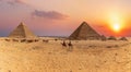 Sunset panorama of the Great Pyramids of Giza, Egypt Royalty Free Stock Photo