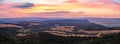 Sunset panorama, inspiring landscape, green forest and mountains