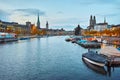 Sunset panorama of Zurich and reflection in Limmat River, Switzerland Royalty Free Stock Photo